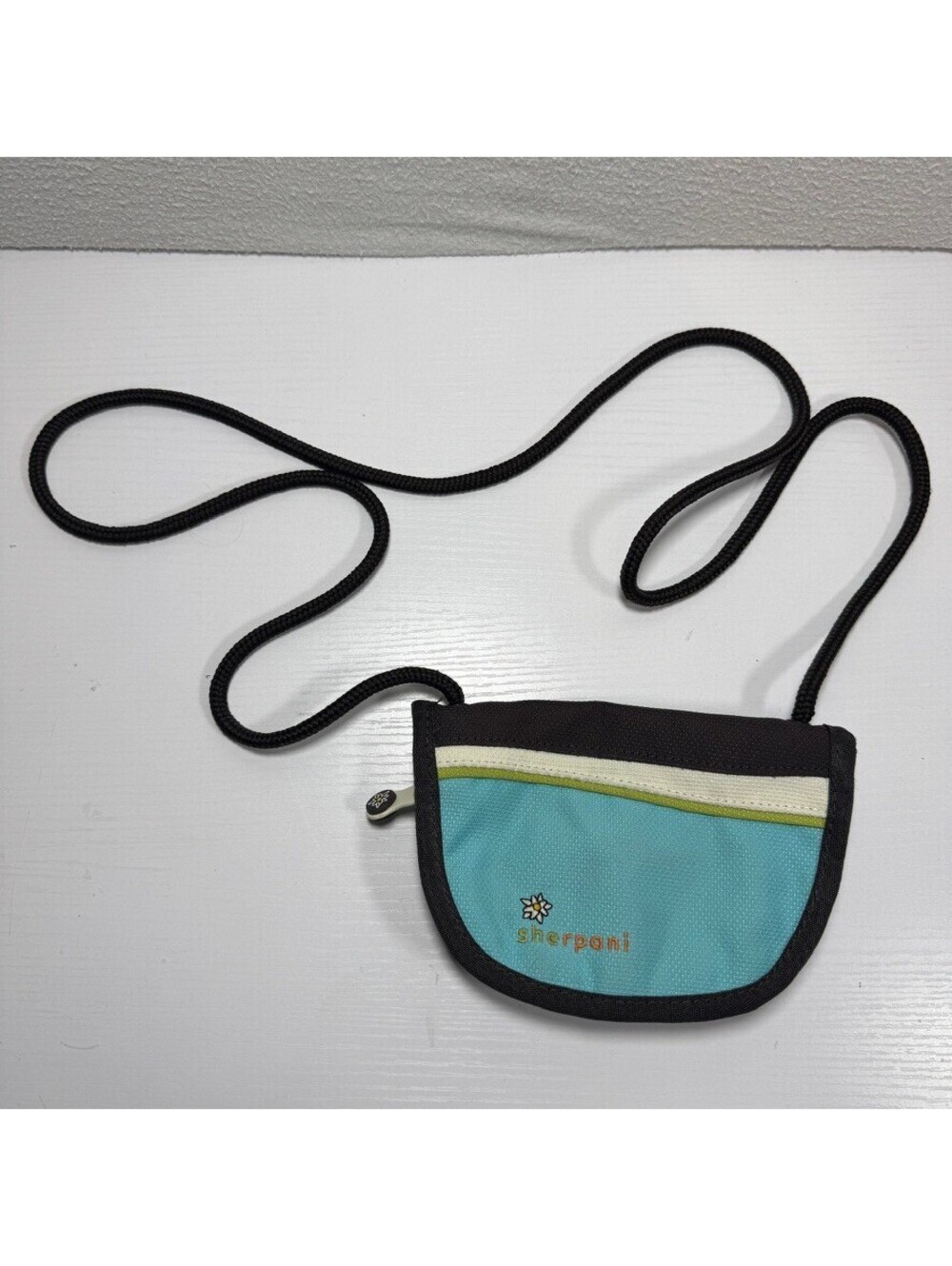 Y2K Sherpani Compact Blue Crossbody Bag with Daisy Design and Adjustable Strap